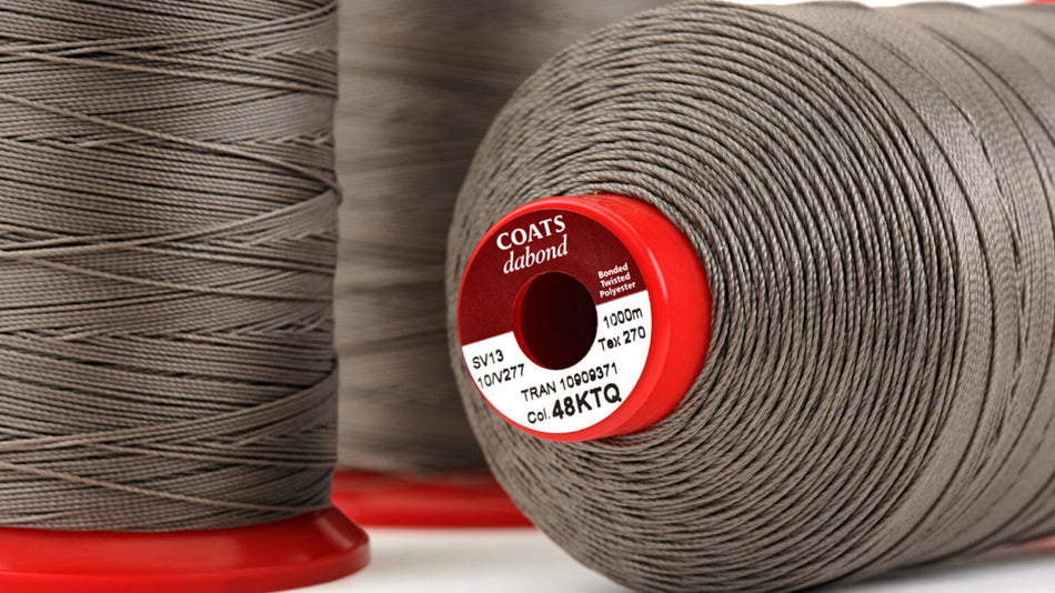 Dabond Bonded, twisted continuous filament polyester thread.